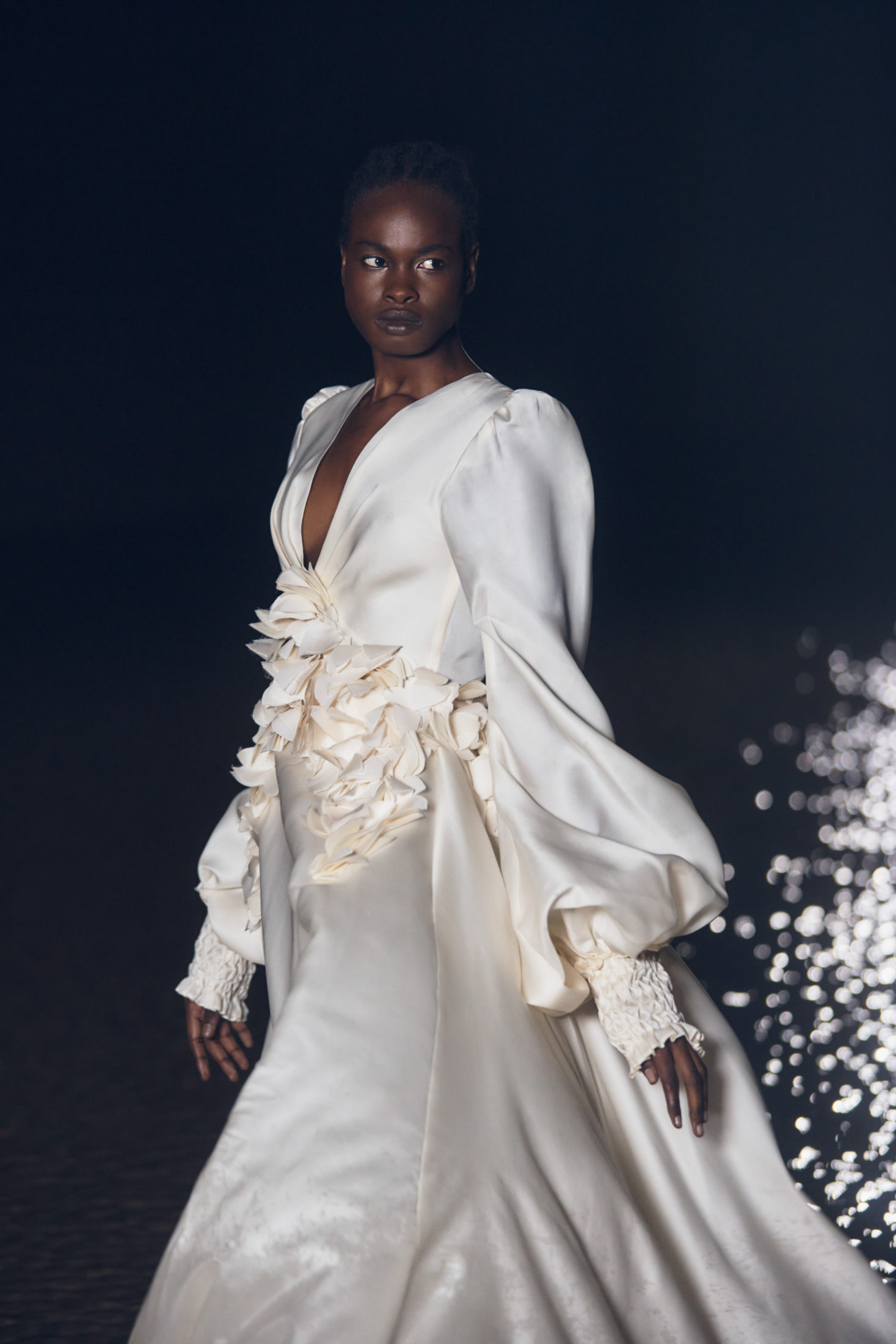 Murashka wedding gown with petal embroidery and ruched sleeve details. Featured on The Lane Fall 22 Bridal Week.