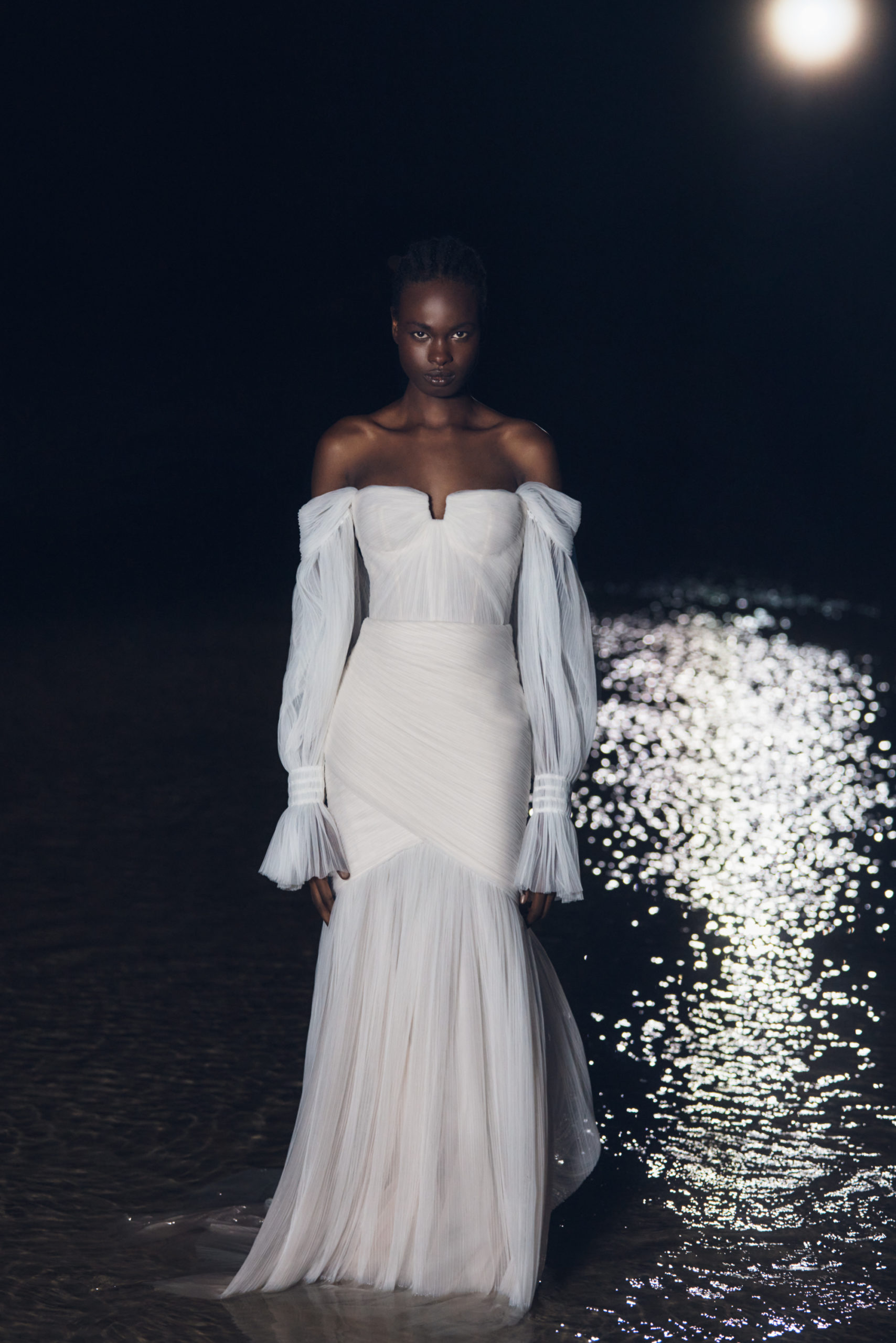 Ruched tulle wedding gown by Alena Leena. Modelled on The Lane Fall 22 Bridal Week Runway.